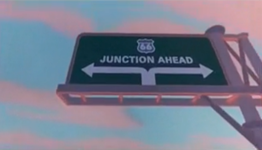 A sign that reads, "Route 66 Junction Ahead".